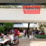 Fall BAMSA Spring 2023 Red Block Bash, an image of the courtyard at the University of Houston